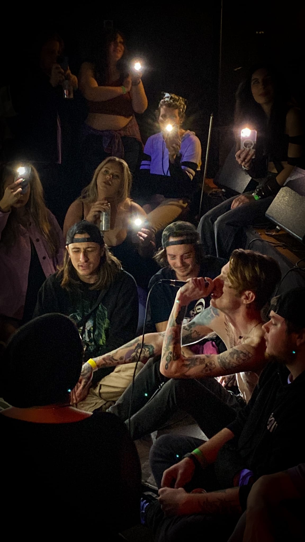 Sam Betancourt sits and sings in the crowd during Overnight's set at the Alabama Music Box. (Photo: Tandra Smith)